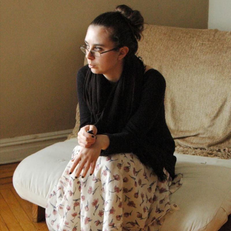 Holly Chayes sitting on a chair