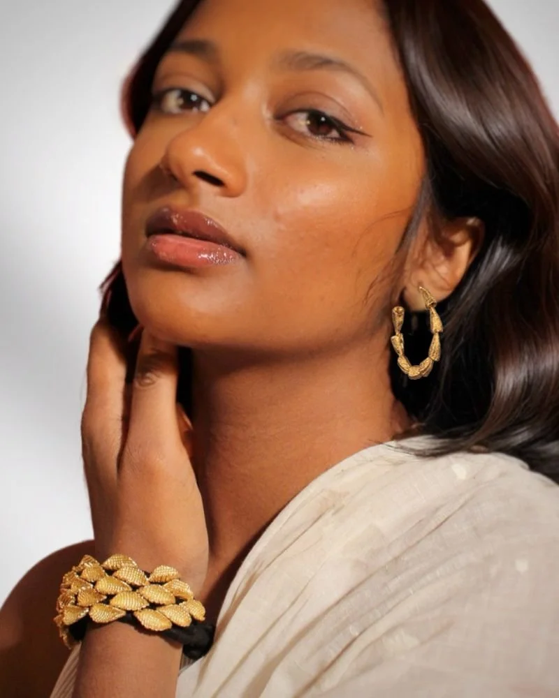 Woman wearing Fyoli Fyoli Magnolia Seedpod Gold Bracelet