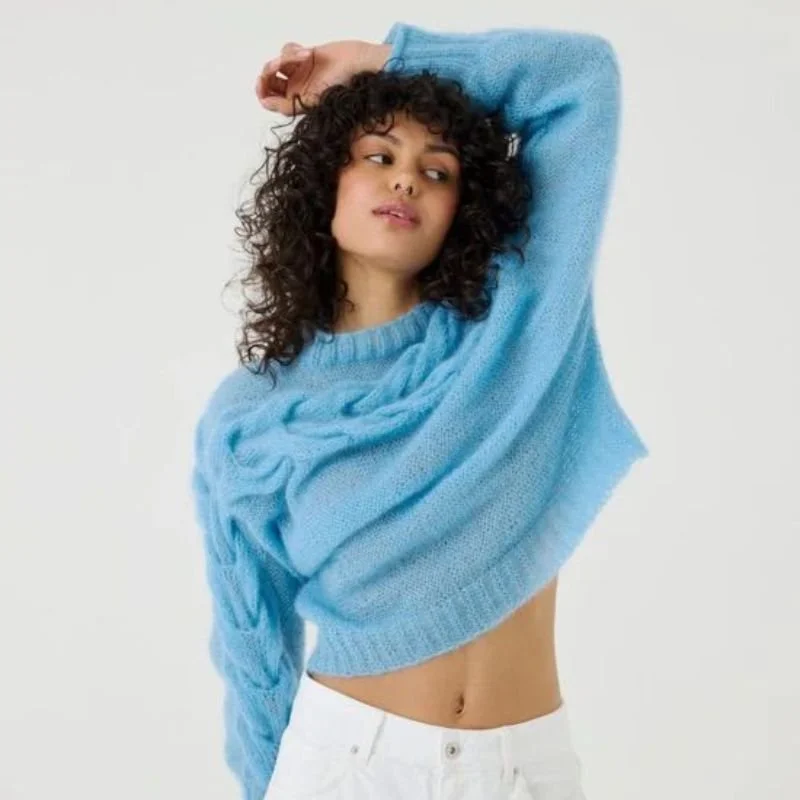 Women wearing April Knit Studio blue sweater
