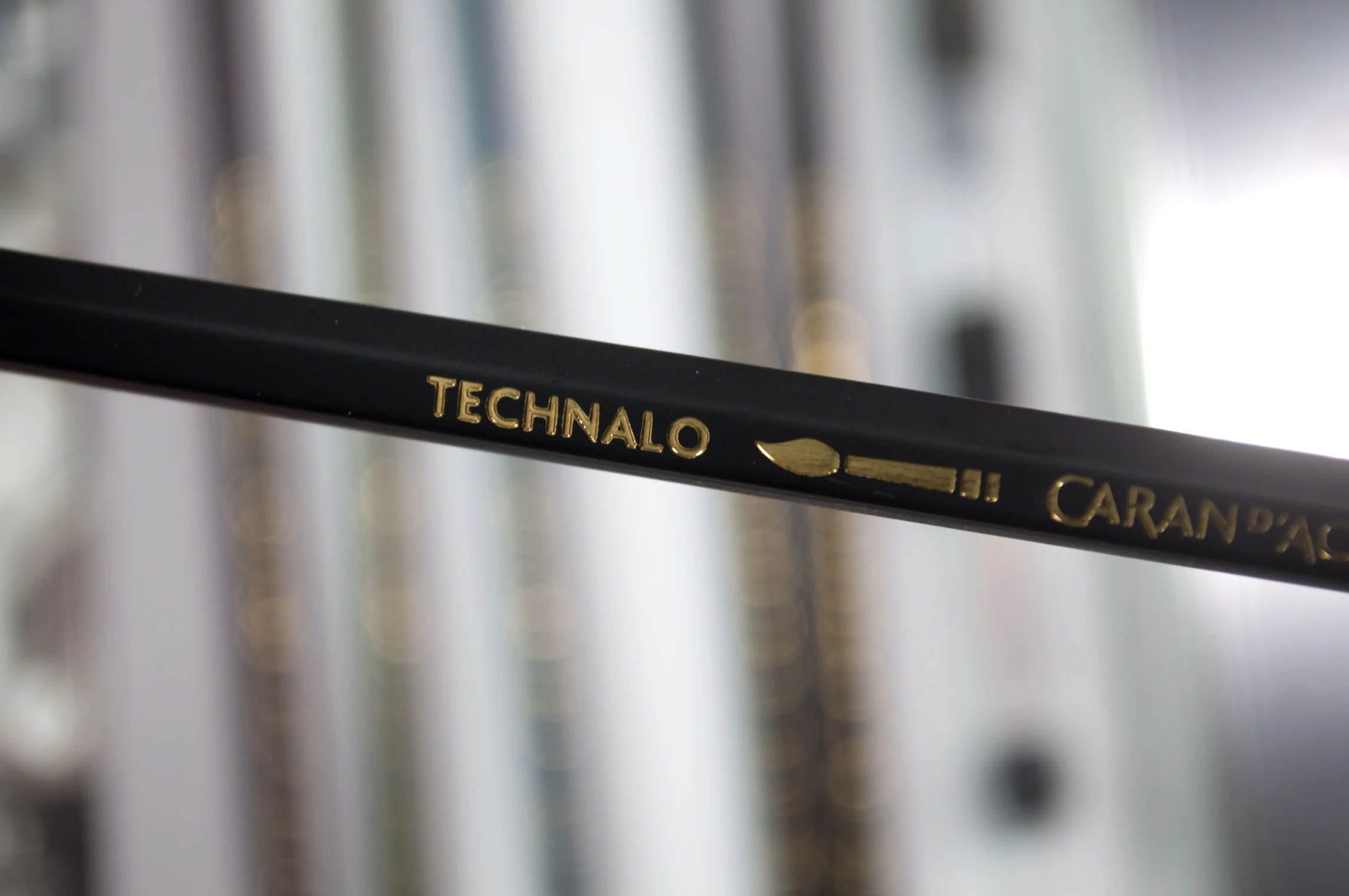 Technolo Graphite name and paintbrush.jpg
