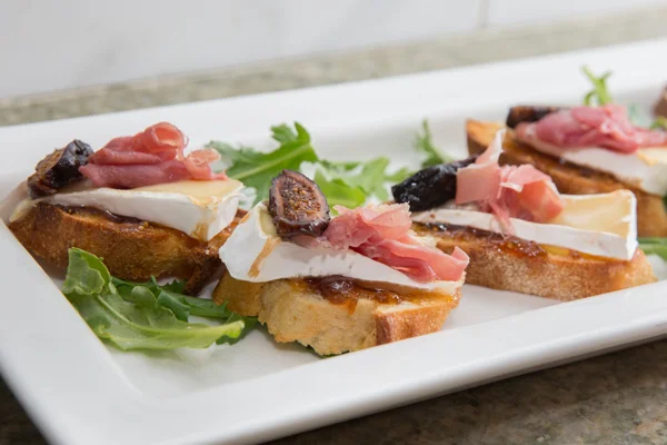 Fig, Brie and Brie crostini