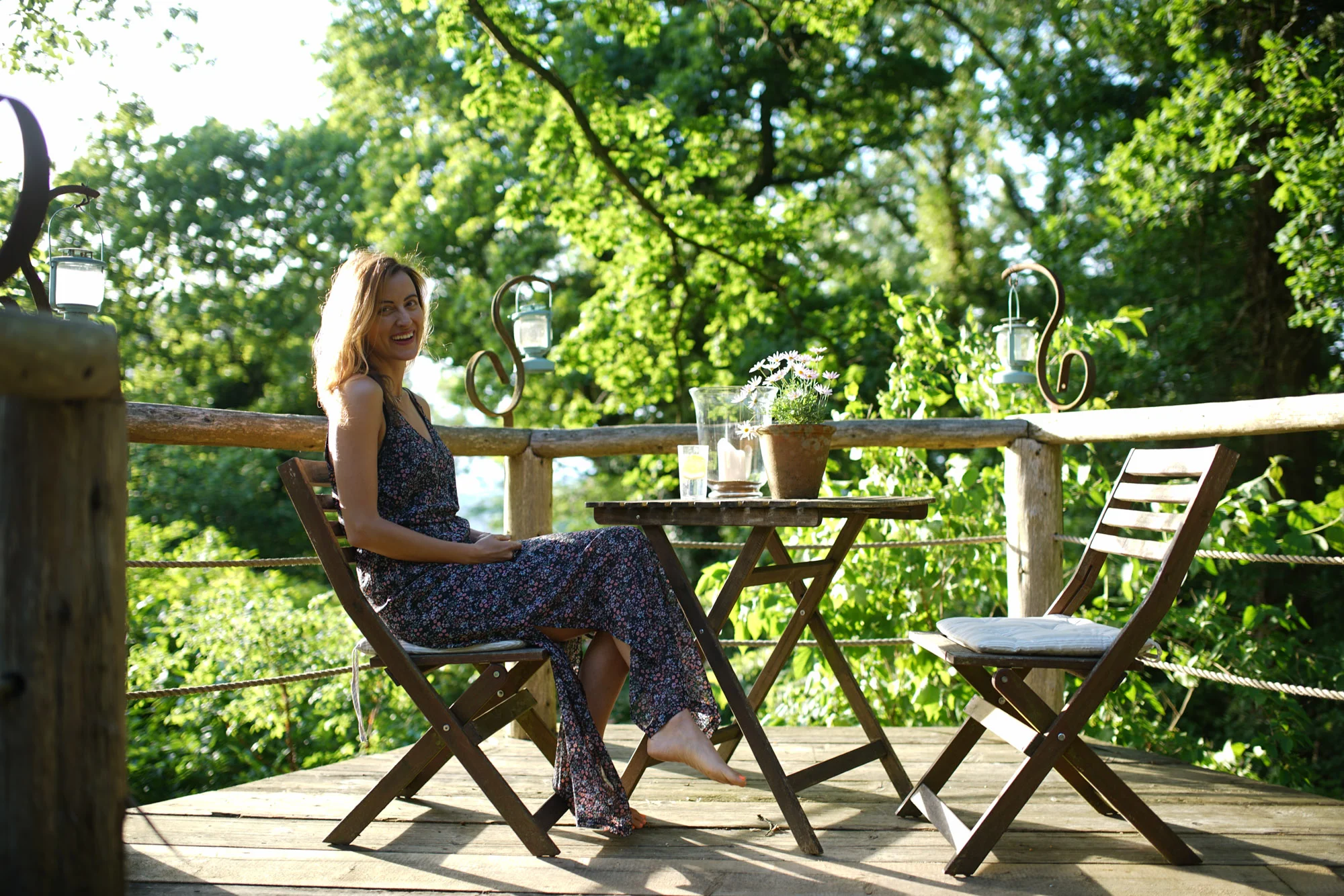 Feet on the ground, gin in reach. One happy birthday girl.