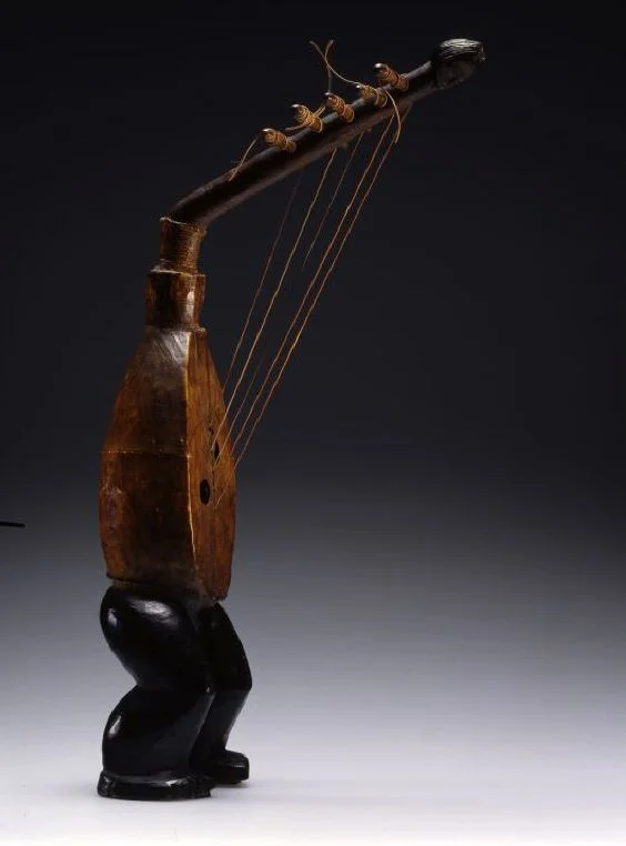 Harp from Congo; wood, leather and plant fiber. 20th century.