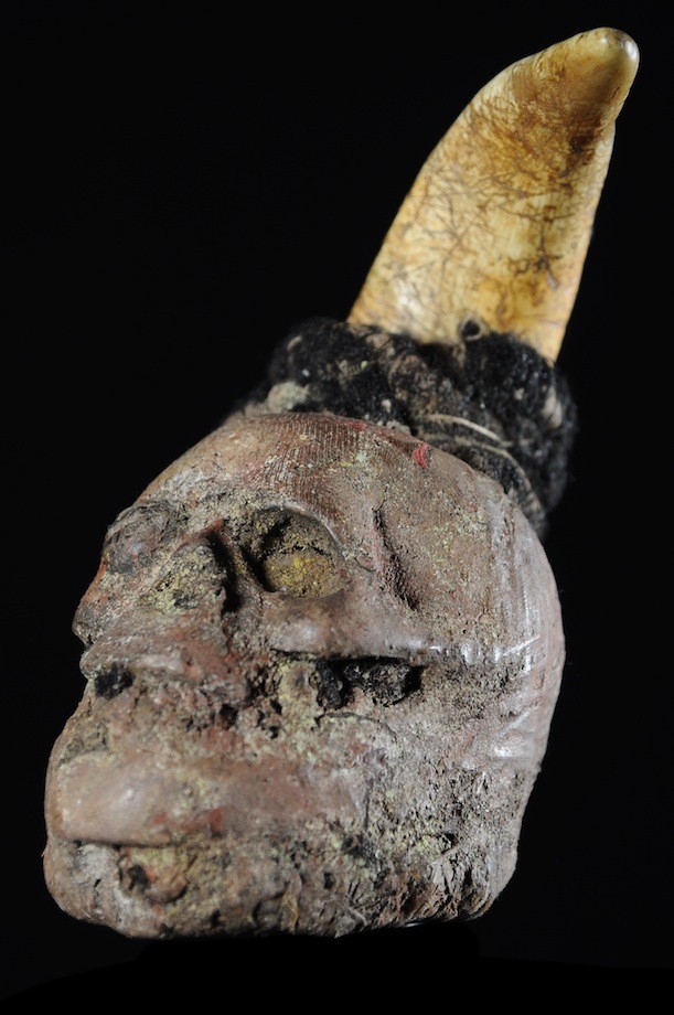 A child's skull used in the divination rituals of the Ada tribe of Togo and Benin. It is accompanied by prayer and sacrifices. This cult was banned in 1970 and has gone underground. Violators are imprisoned. Height: 9 in. (22 cm).