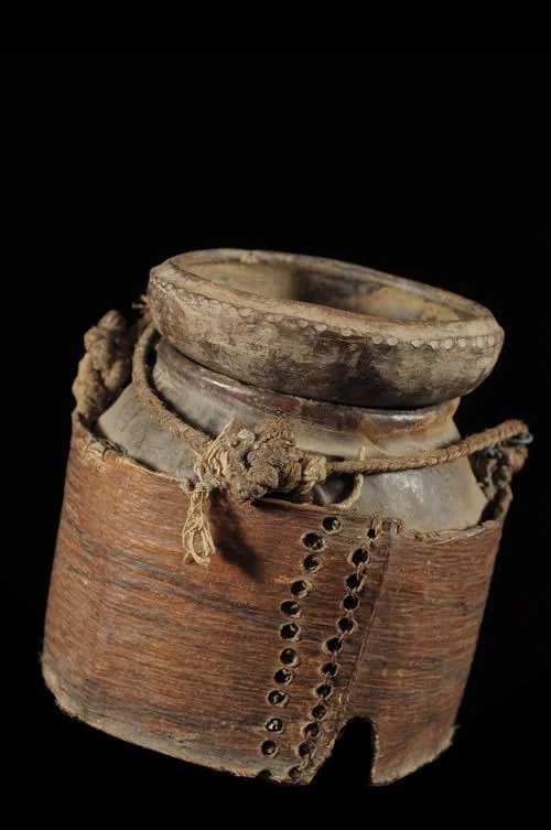 A Guro mouse box for divination. Inside, a horizontal panel with a hole divided the box. Hungry mice were put into the bottom section and during divination they climbed through the hole and ate food in the top section which moved around little objects like turtle shells, porcupine needles, batons, etc. The position in which these objects were found provided the oracle. From Yamoussoukro, Ivory Coast, 1950s.