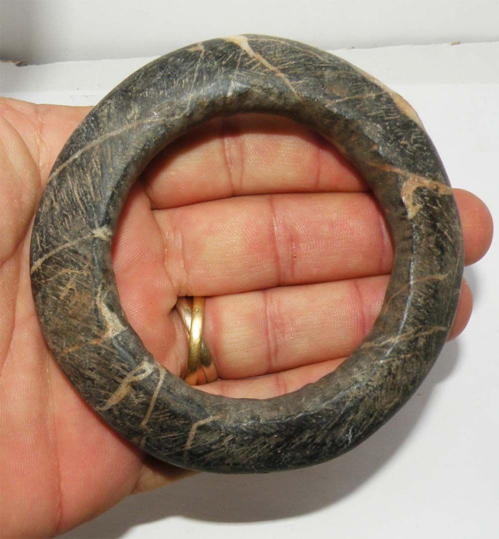 A polished stone bracelet found in Mauritania. Age: 3,000-5,000 BC.