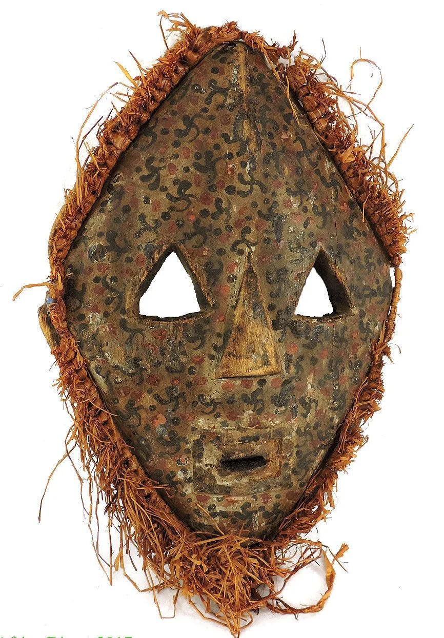 A Pygmy or Lega tribal mask. Early to mid 20th century.