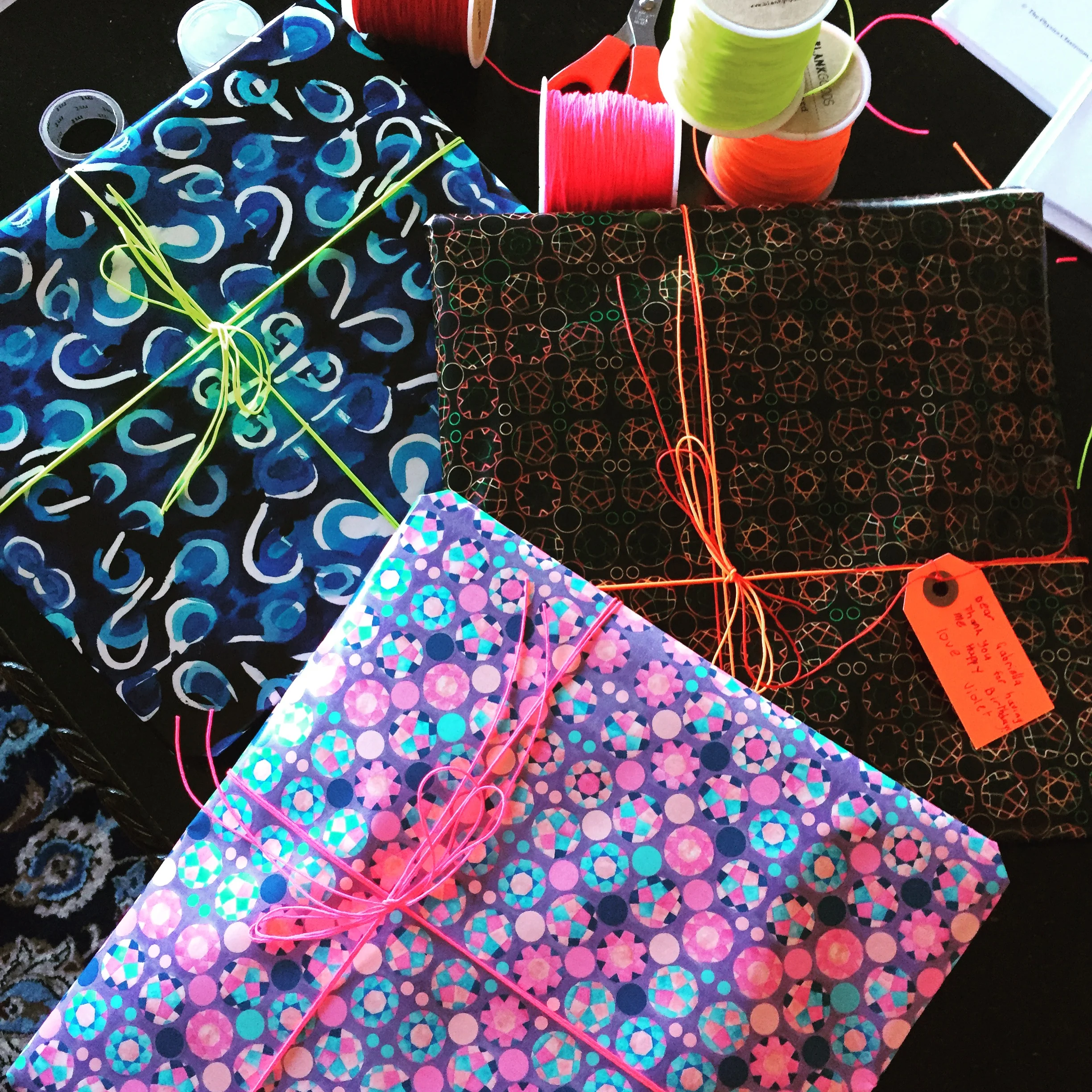 gift wrap designs 'choppy surf' and 'when heawood met lindgren'