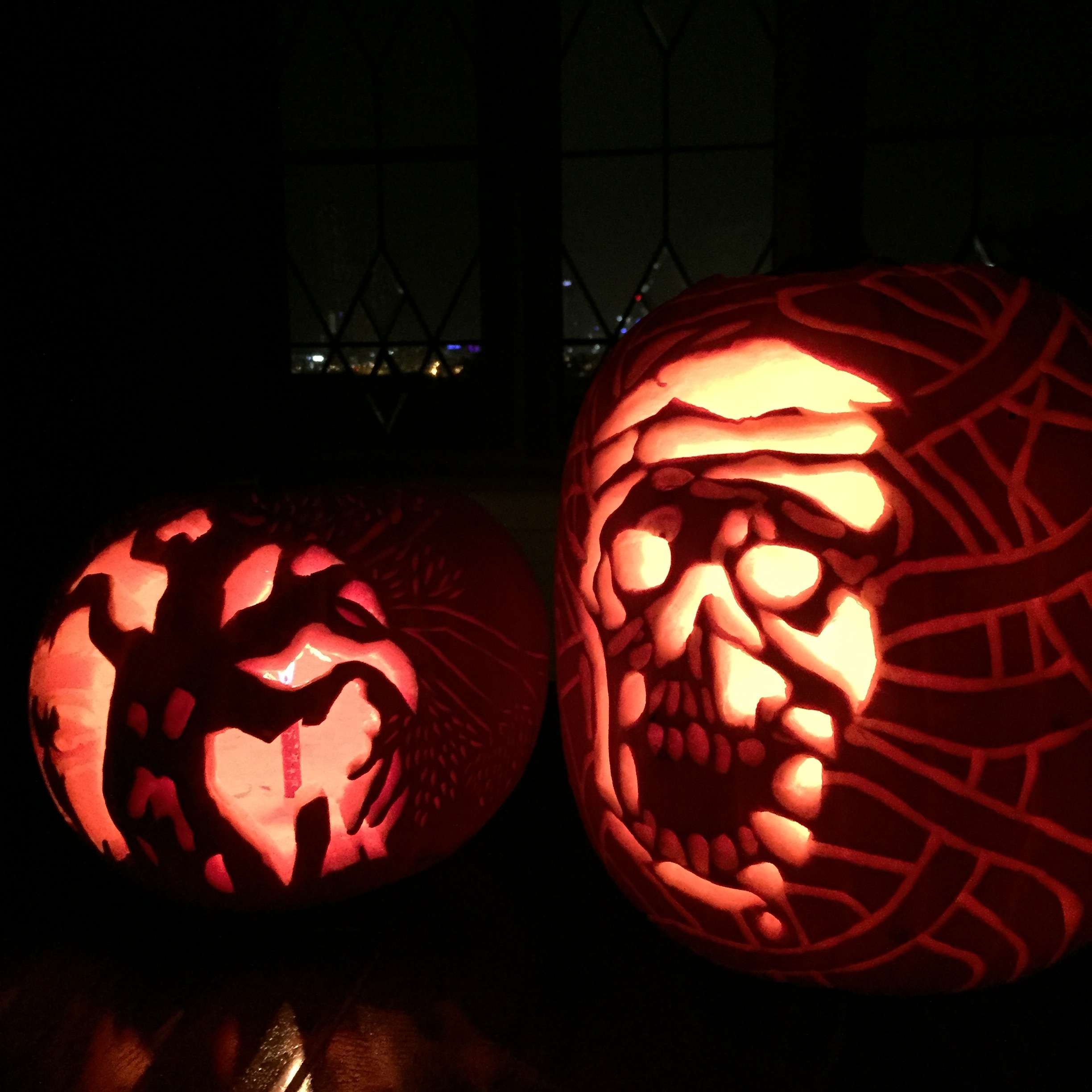 hand carved jack-o-lantern sculptures inspired by 'mummies of spooky hollows'