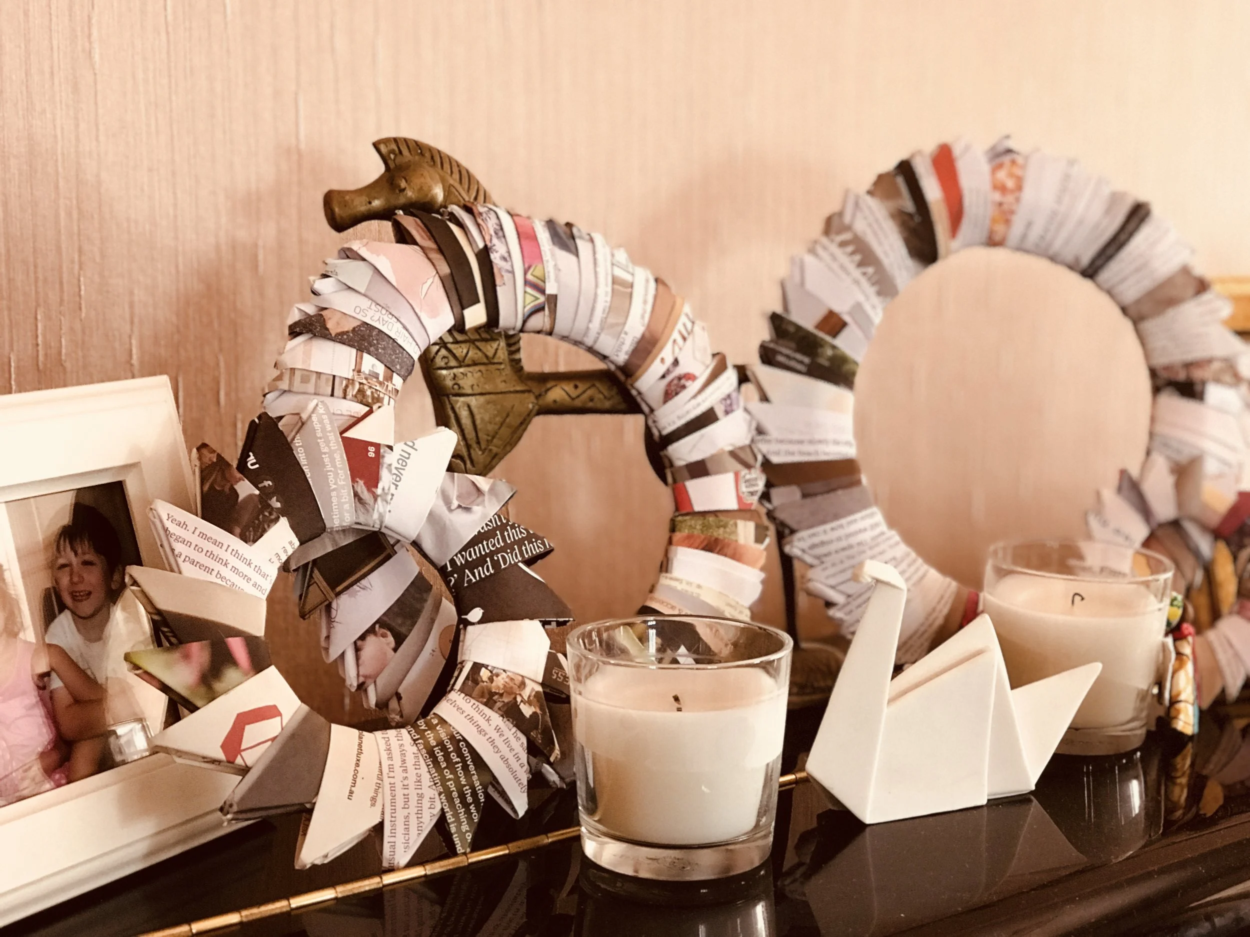 My children's matte magazine wreaths atop our piano - a perfect, calming school holiday activity!