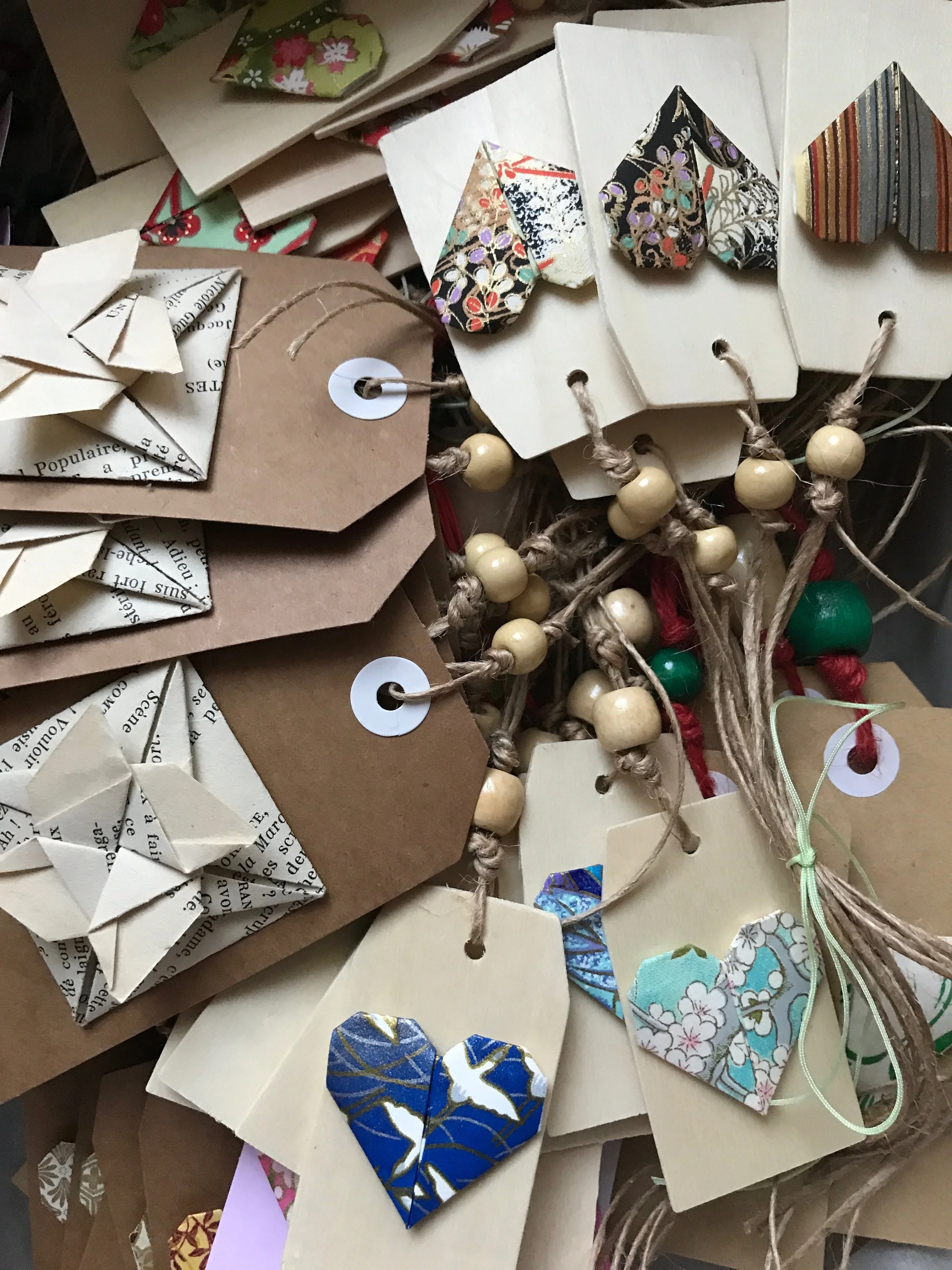 Beautiful gift cards incorporating origami elements and natural and upcycled materials.