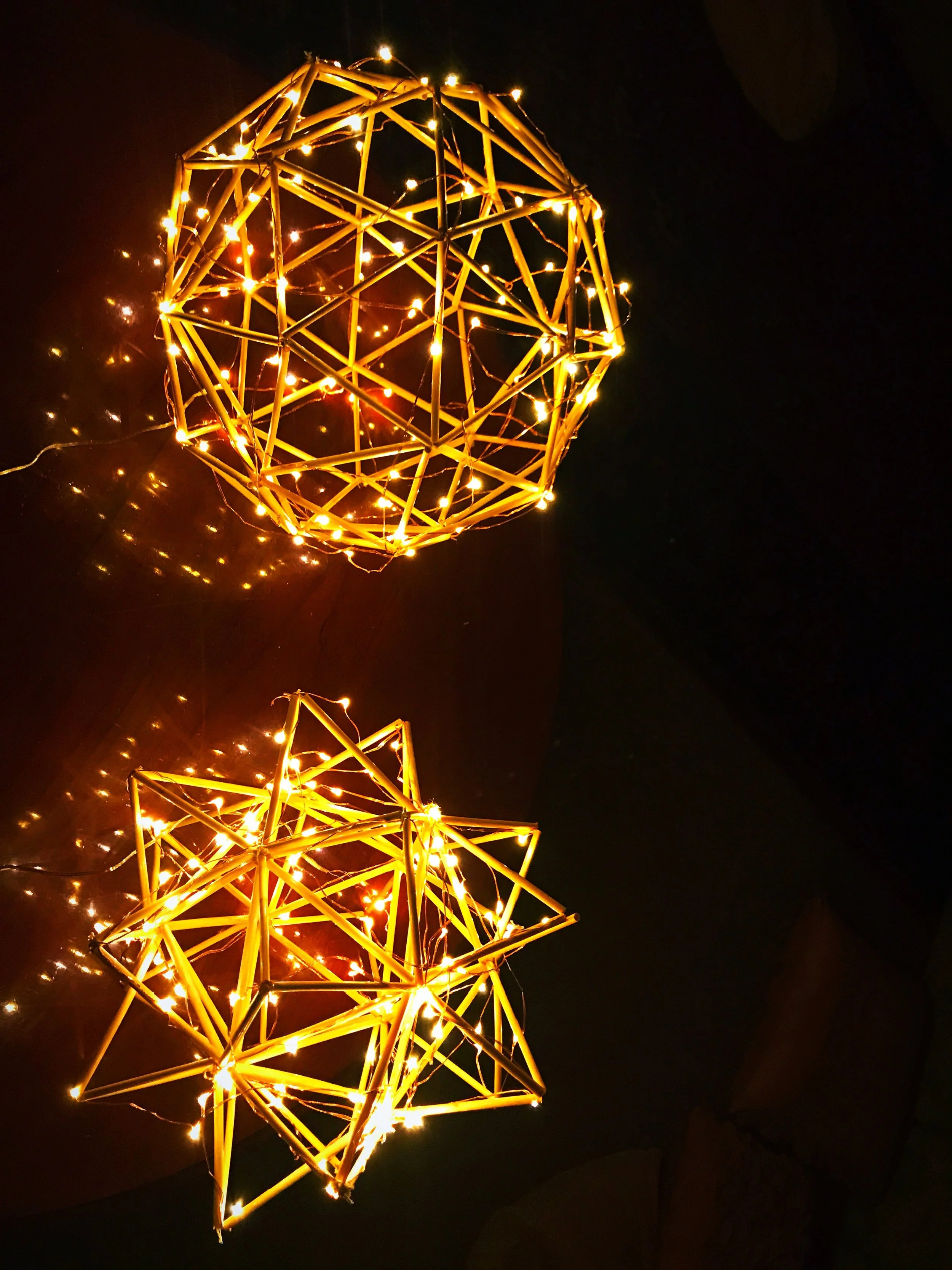 Illuminated ‘sun’ and ‘moon’.