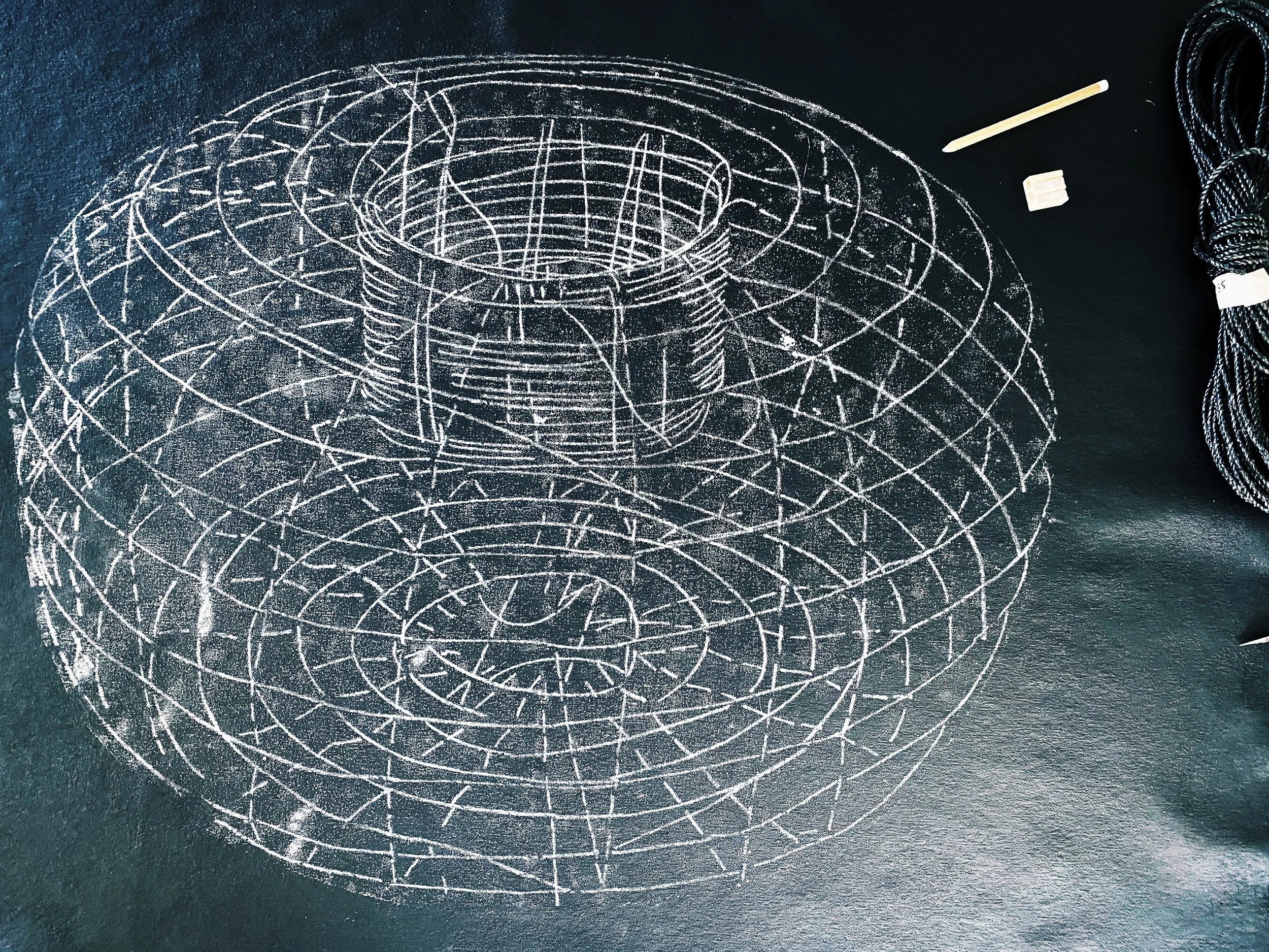 "Black Hole" (initial chalk sketch on black gesso canvas to be stitched)