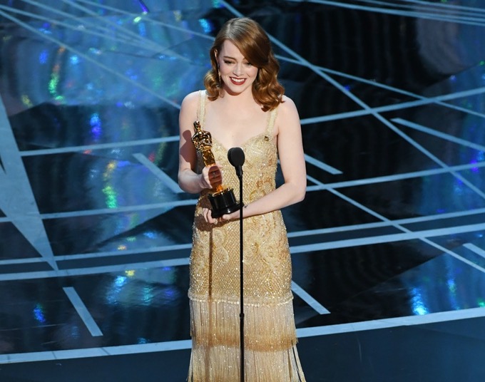 Emma Stone accepting her award for Best Actress in a Leading Role.