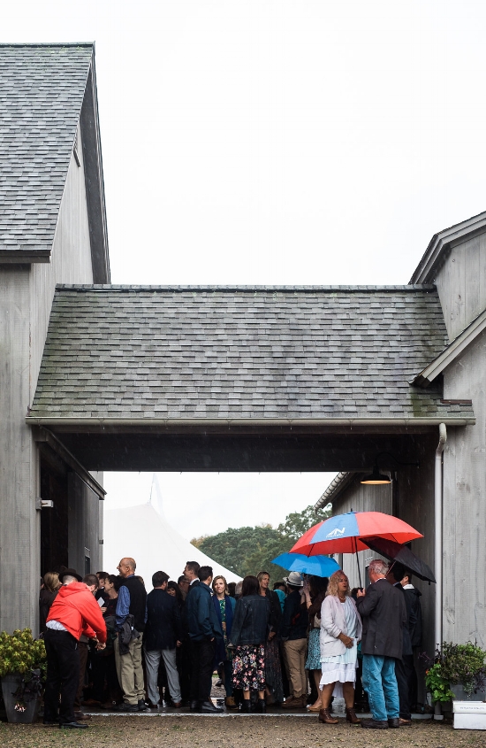Guest huddled by the barn - Pearl Weddings & Events