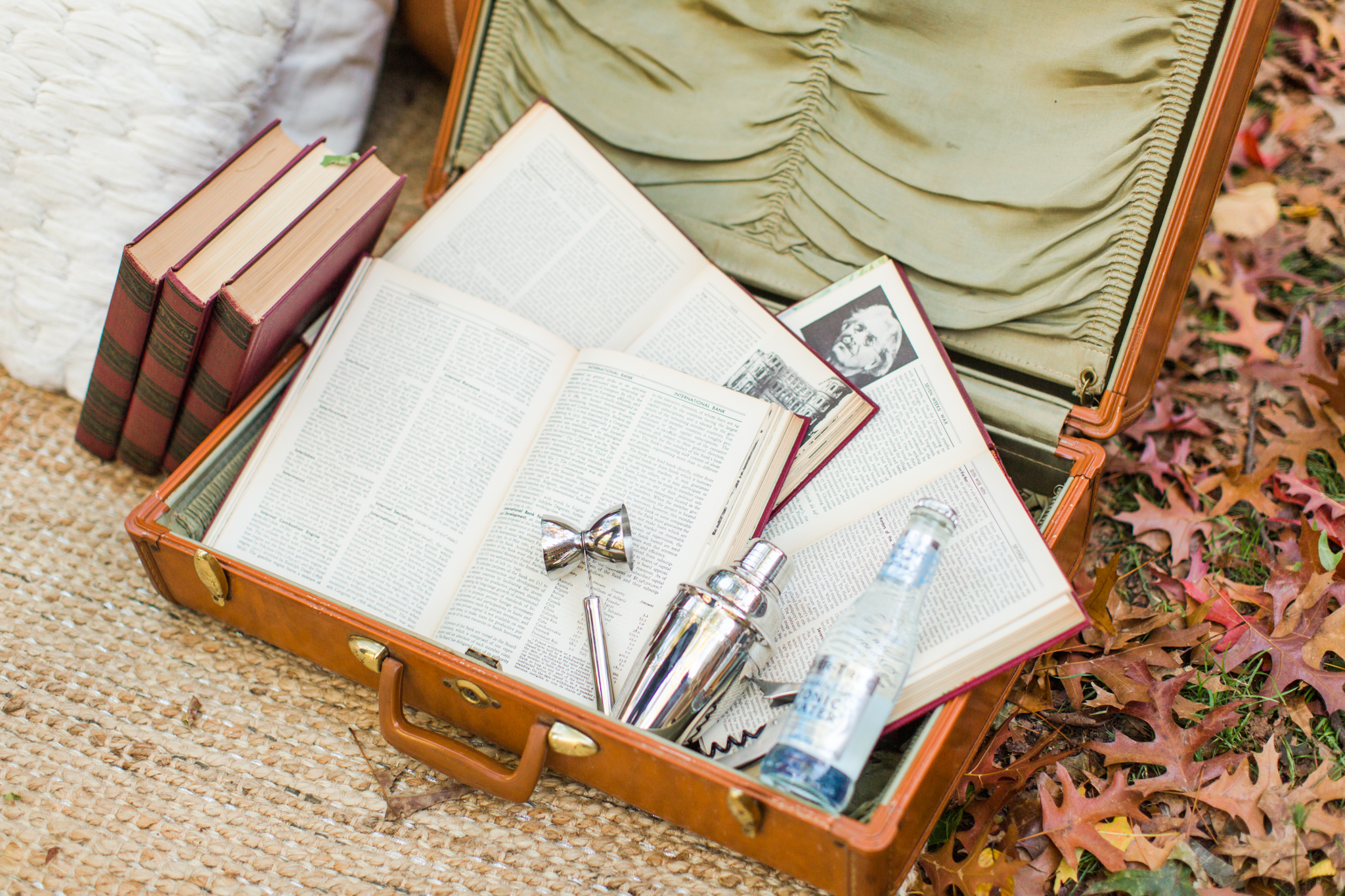 Vintage wedding details and vintage suitcase with bar set up. Pearl Weddings & Events