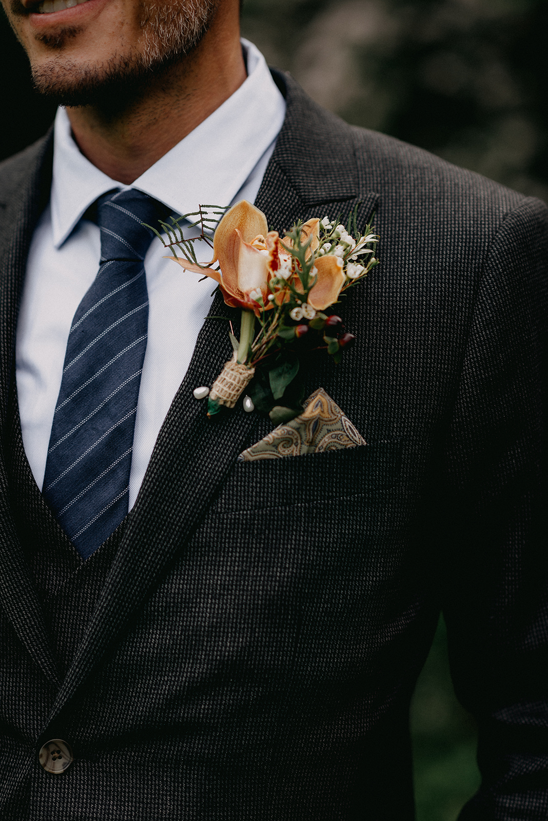 Groom boutonniere with a tweed detailed suit - Pearl Weddings & Events
