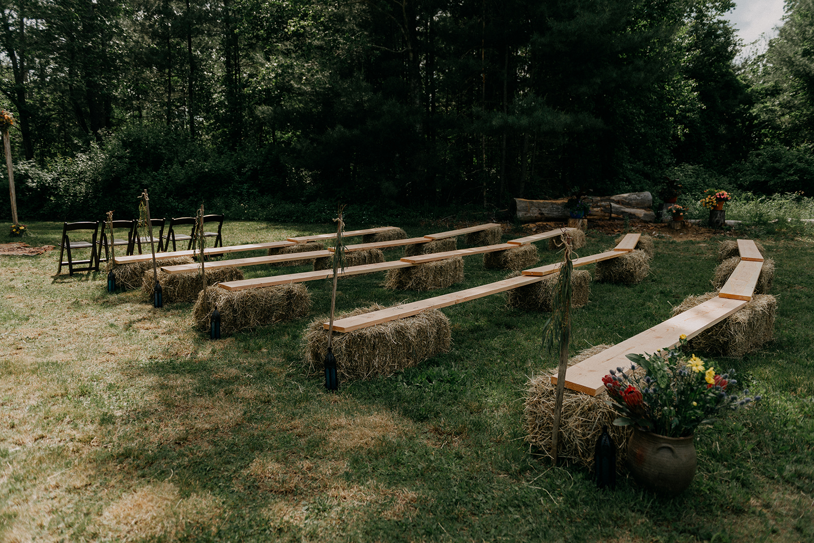 Outdoor ceremony seating for a antique farm, boho wedding - Pearl Weddings & Events