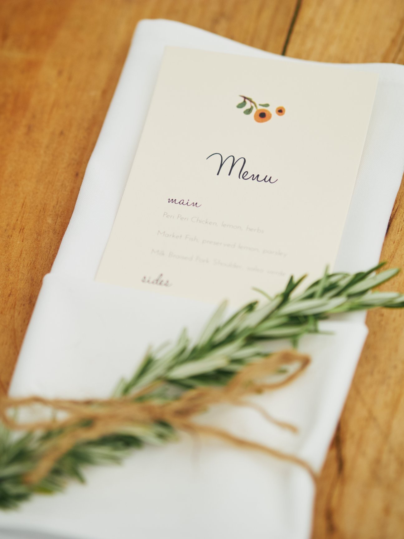 Wedding menu, napkins with a sprig of rosemary tied with hemp - Pearl Weddings & Events