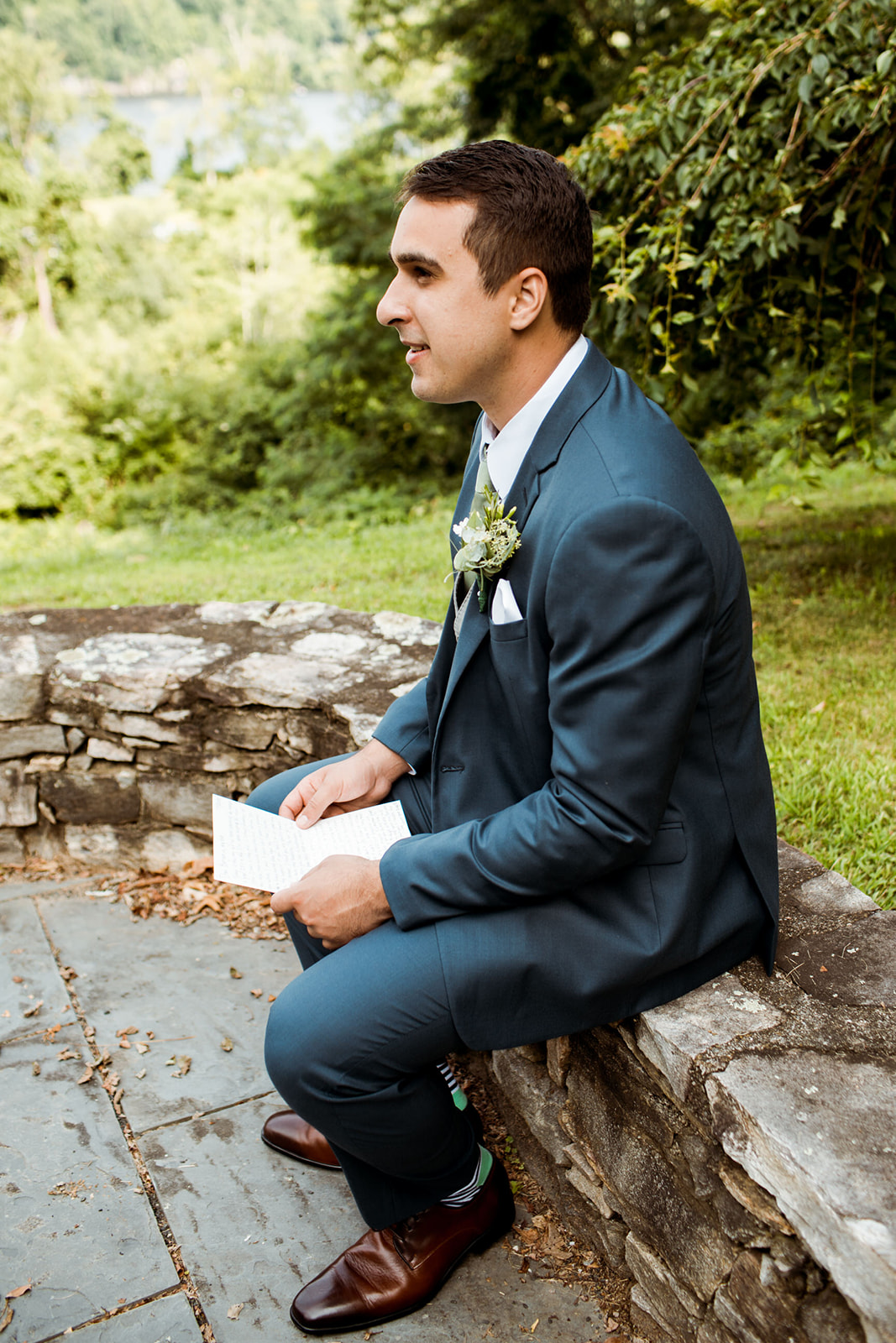 Groom reading his note from his bride - Pearl Weddings & Events
