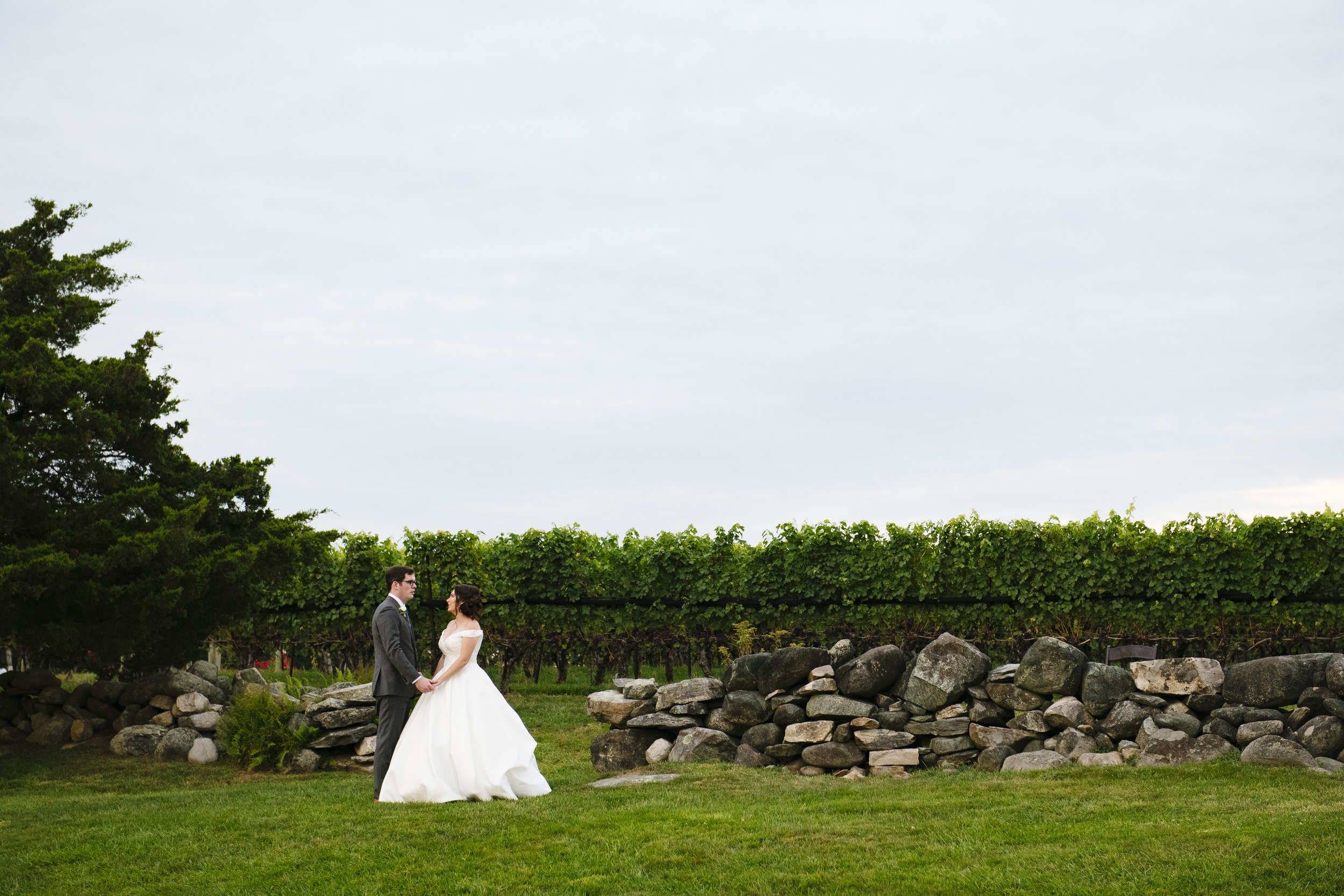 Bride and groom getting married at Jonathan Edwards Winery in Connecticut - Pearl Weddings & Events