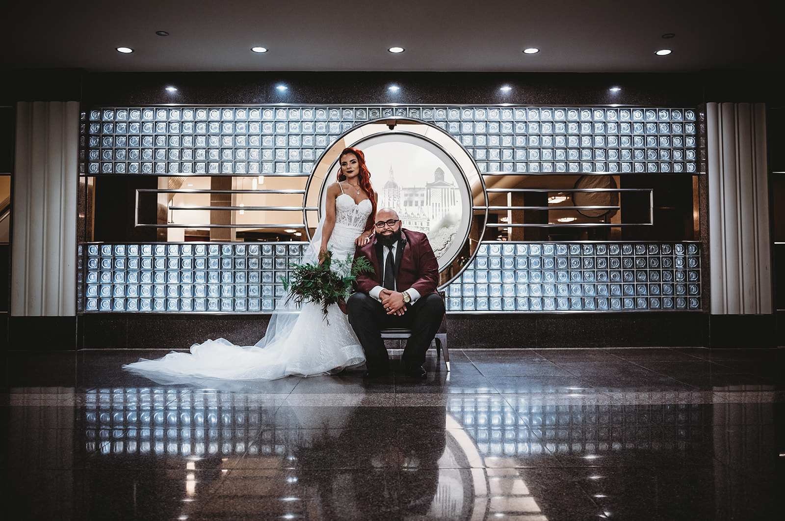 Badass bride and groom in Hartford, Connecticut at the old G.Fox bulding - Pearl Weddings & Events