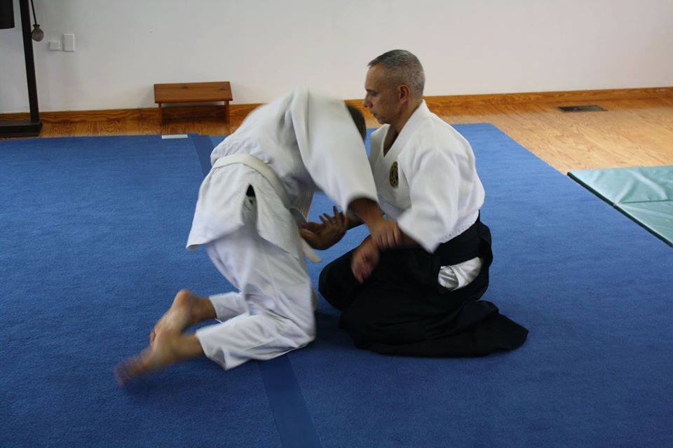 Manny Jimenez Sensei demonstrating suwari tenchi nage .