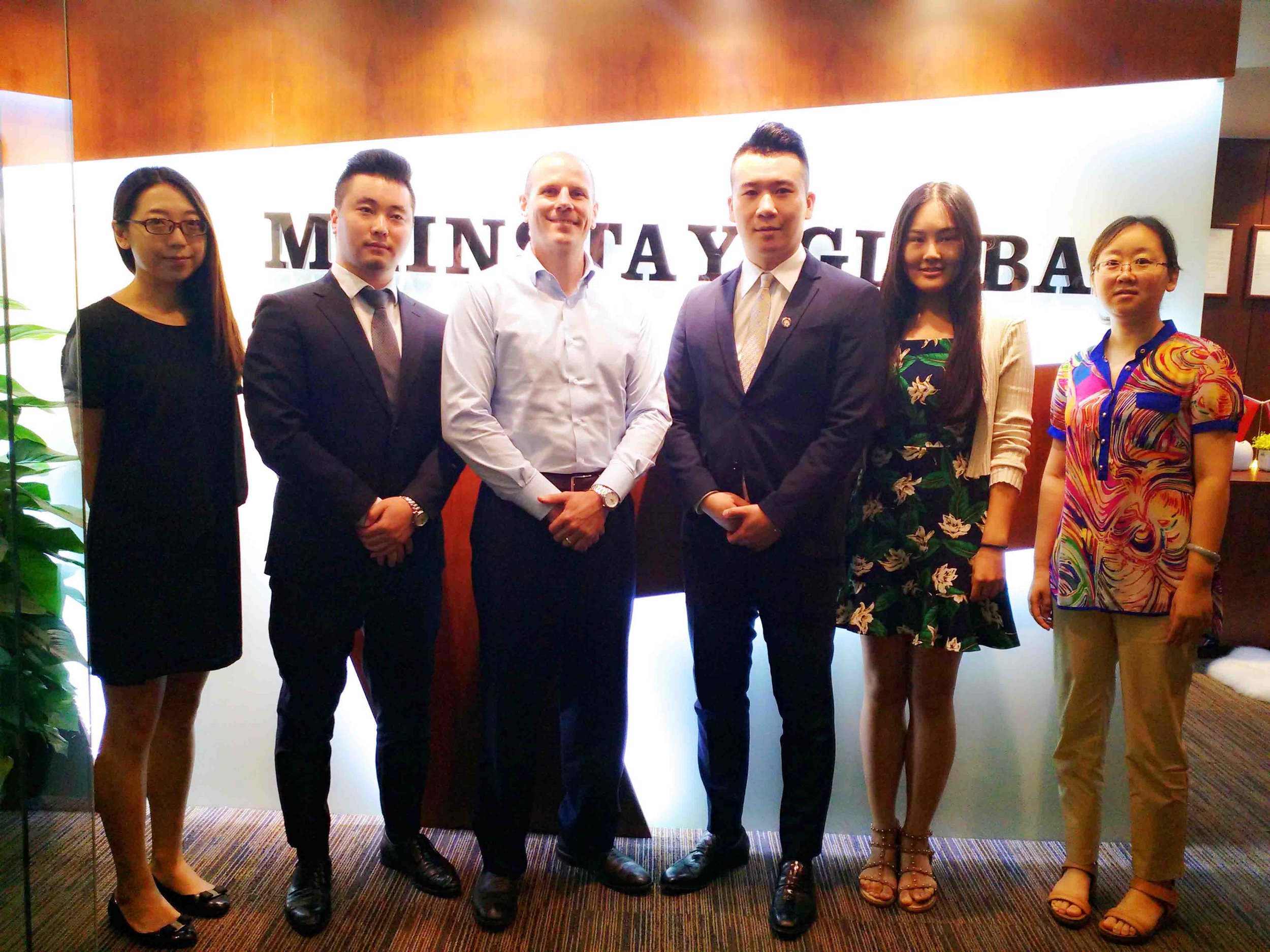 MG BJ Team in front of officea.jpg