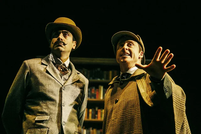Ramiz Monsef and Alan Tudyk as Watson and Holmes