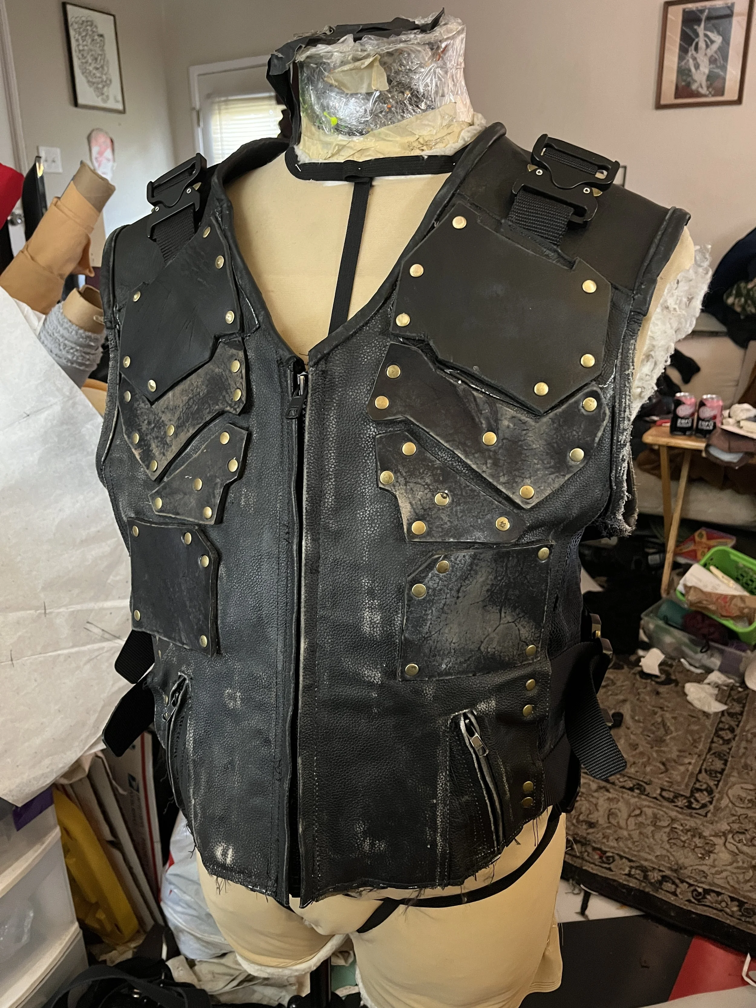  Re worked and fitted vest. Altered to better fit the client and have structure.  