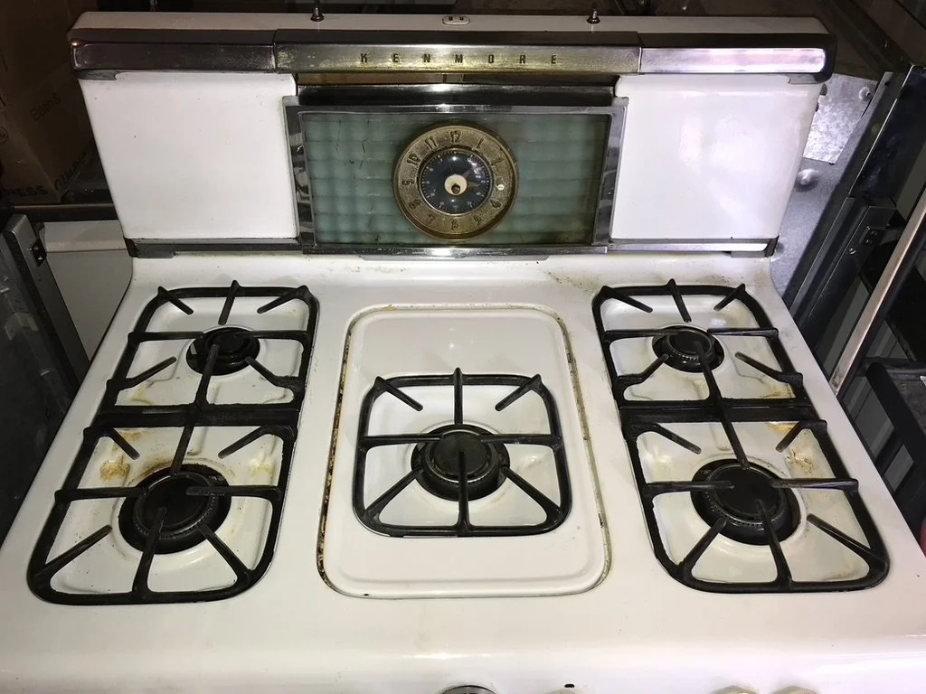 Middle burner swaps out with a handy griddle for lots of (very tiny) pancakes.