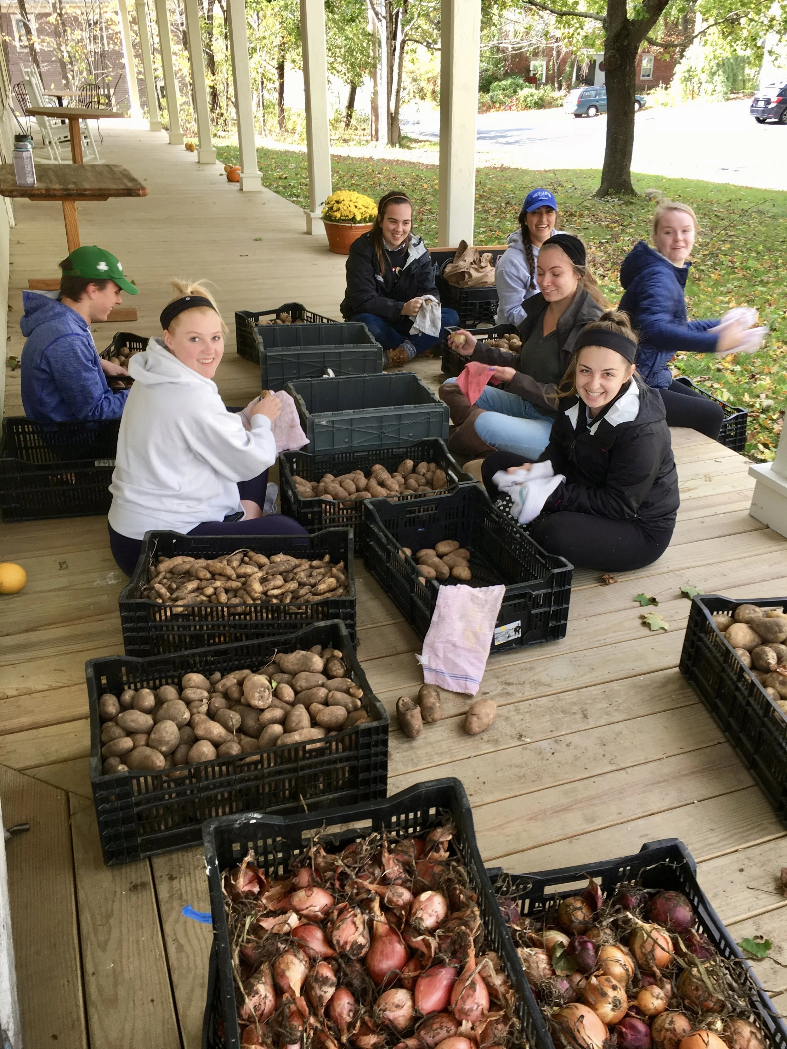 Colby-Sawyer College students doing their homework for a class on food systems.