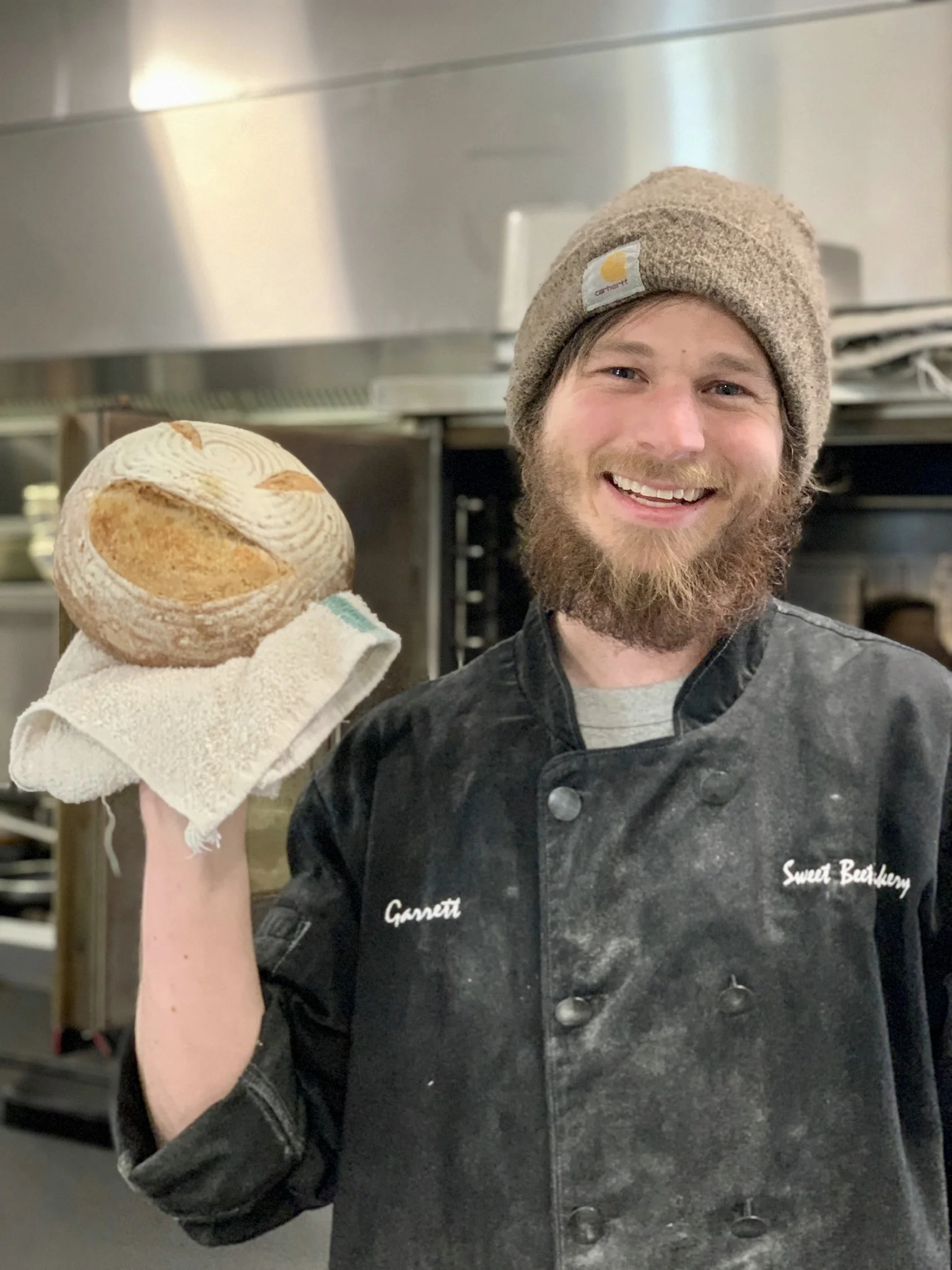 Head baker and kitchen manager, Garrett.