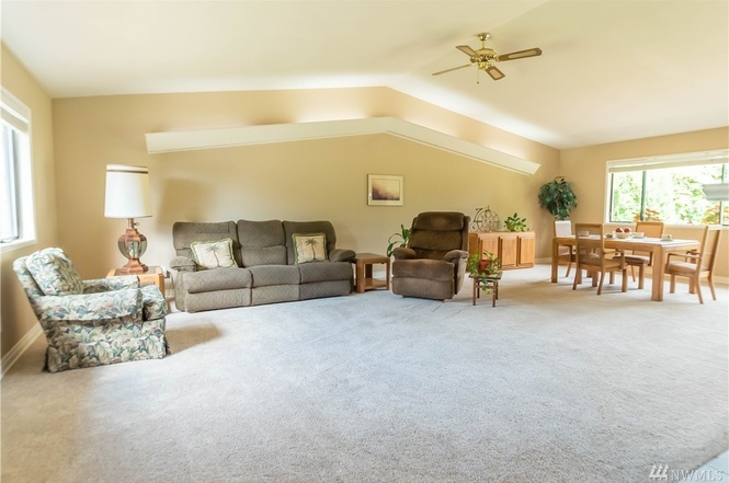 Spacious vaulted ceiling living and dining.