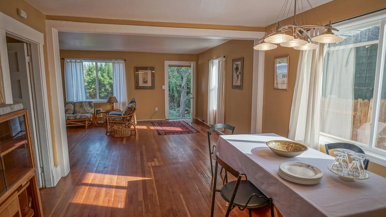 Fir floors and large windows create a space that is warm and bright.