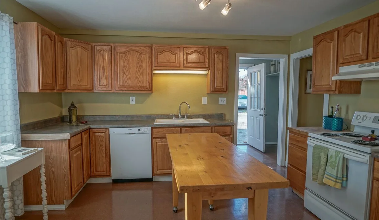 Spacious kitchen is convenient, clean, and ready to go. 