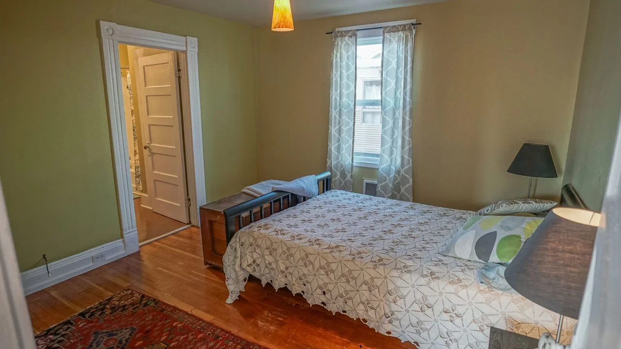 Main floor bedroom with direct access to bath. 