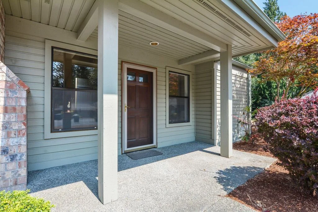 A covered, paved front entrance is convenient in all weather, providing shade, and shelter from rain.