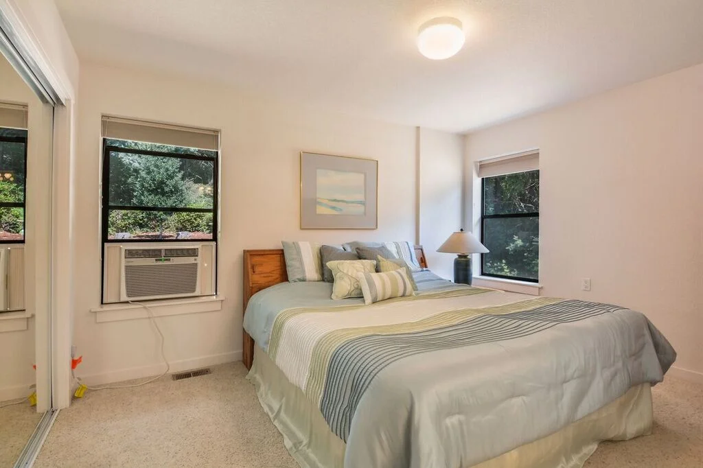Another view of the suite with just part of the mirror doors of the large closet in view. The air conditioning unit keeps the whole house cool even in July and August heat!
