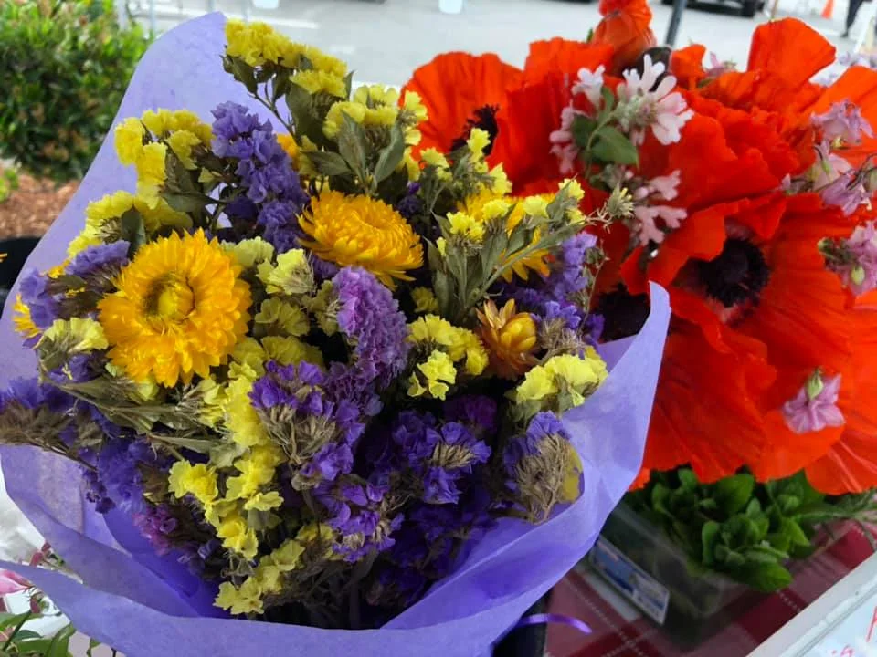 Image from the Port Orchard Farmers Market - Flowers, local berries, veggies, and handmade goods Saturdays April - October.