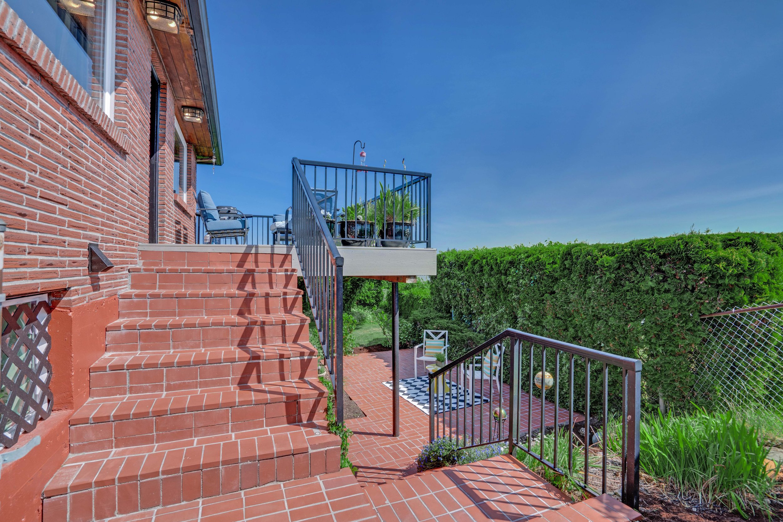 Stairs from Deck to Patio Hale St View Home.jpg