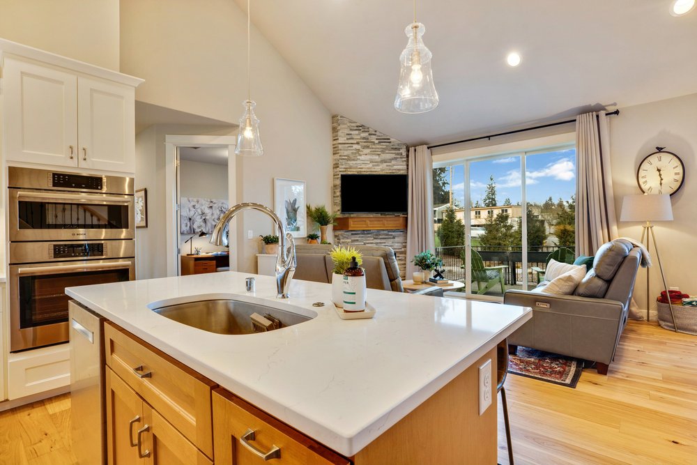 Kitchen and Corner Fireplace Fircrest Condo.jpg