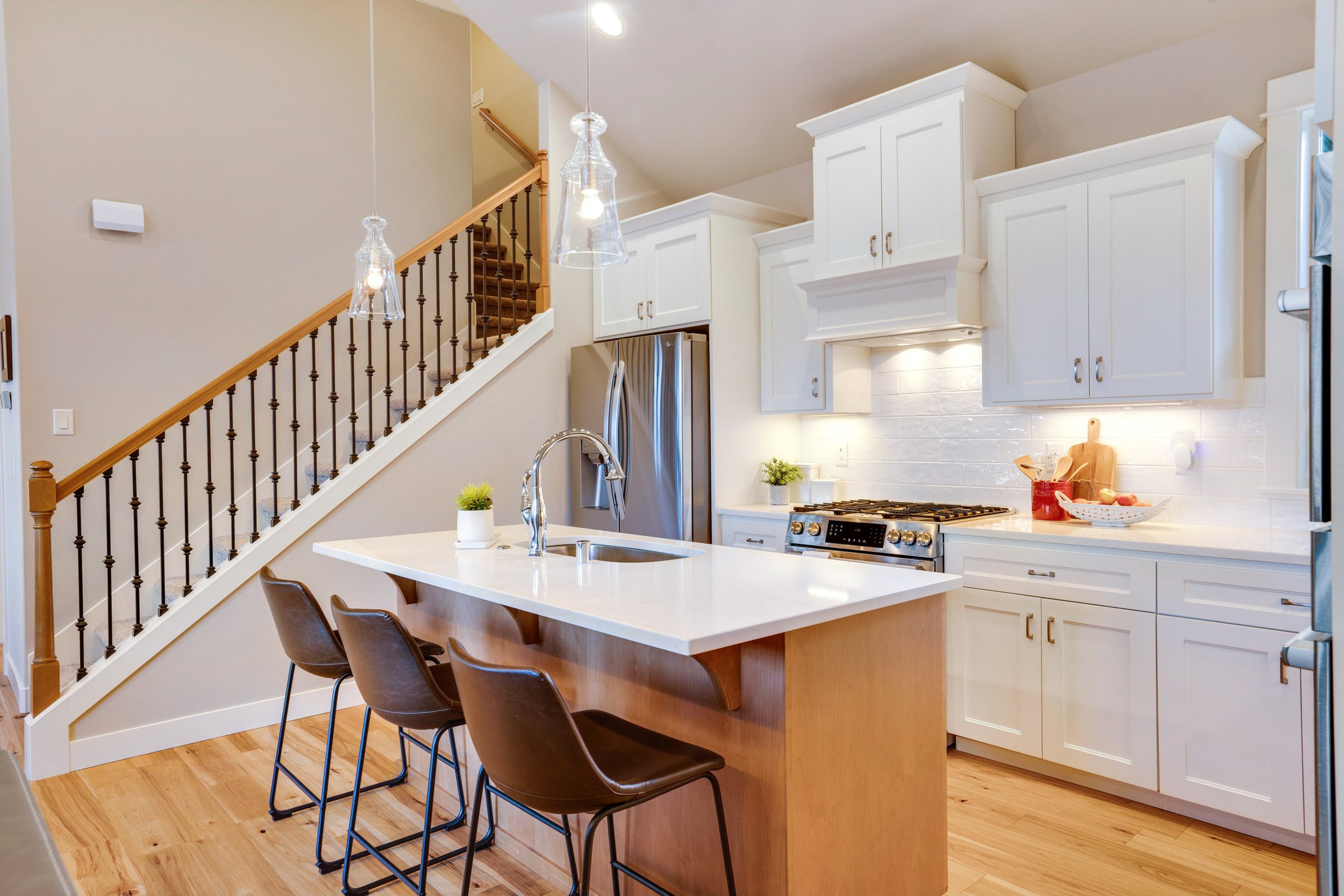 Kitchen Island and Open Staircase Fircrest Condo.jpg