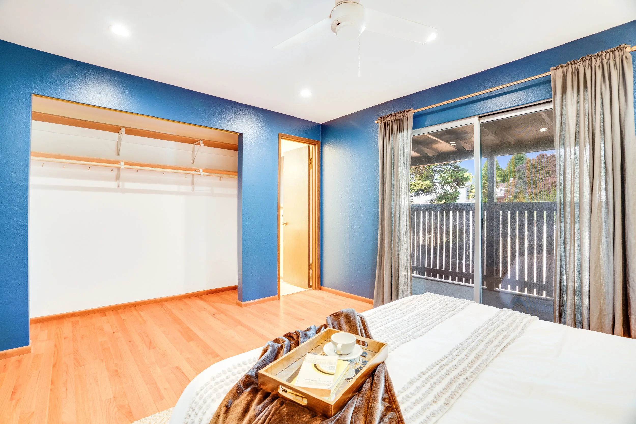 Primary Suite Glass Door to Deck West Tacoma.jpg