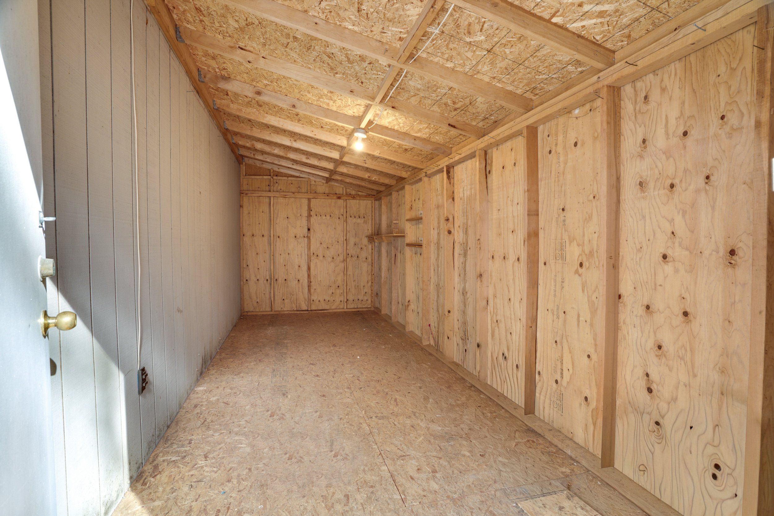 Attached Storage Shed Interior Puyallup 3 Bedroom.jpg