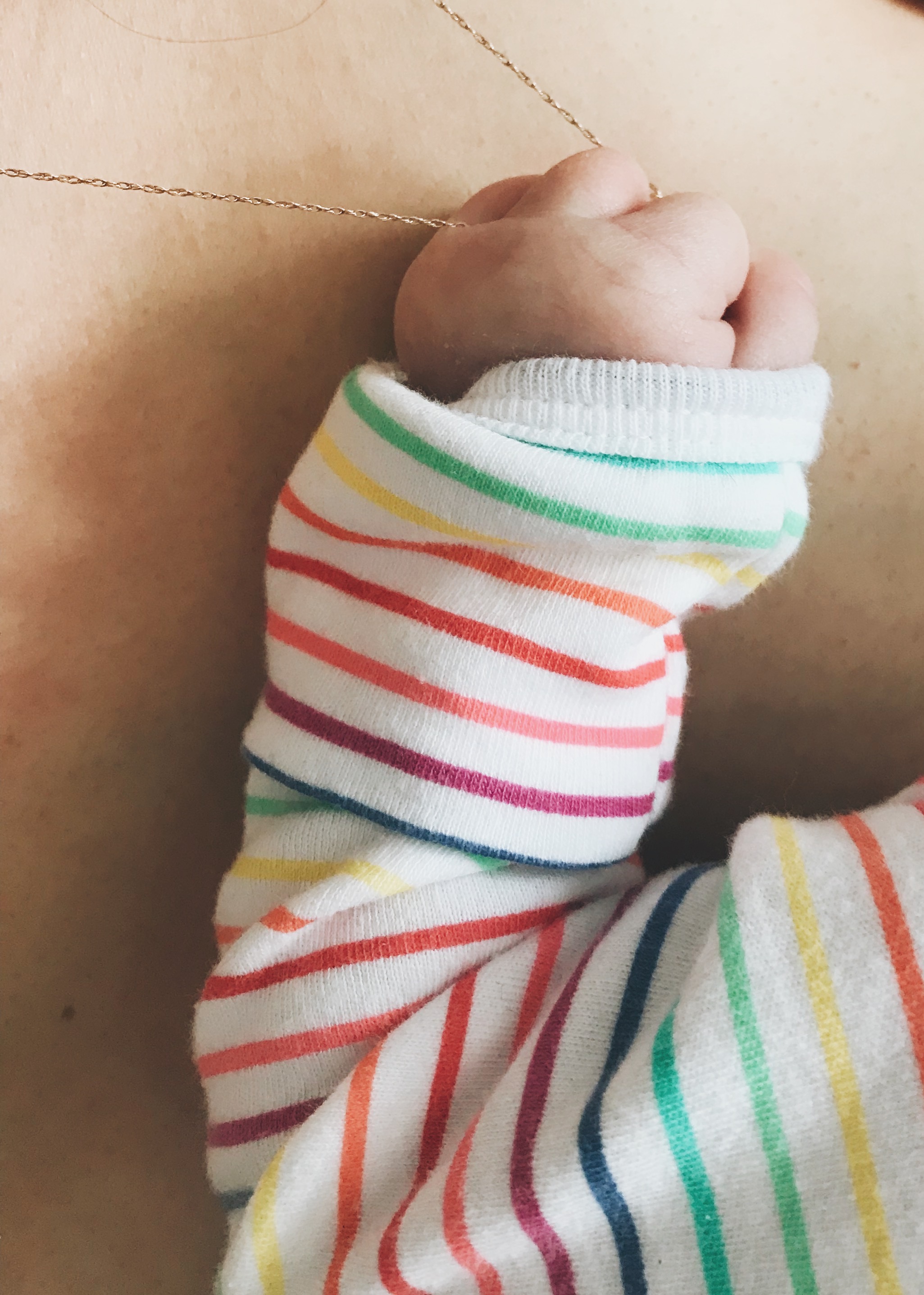 Lora loves to hold tight to Norah’s baby ring which I wear as a necklace. Norah still has the same one on her little thumb.