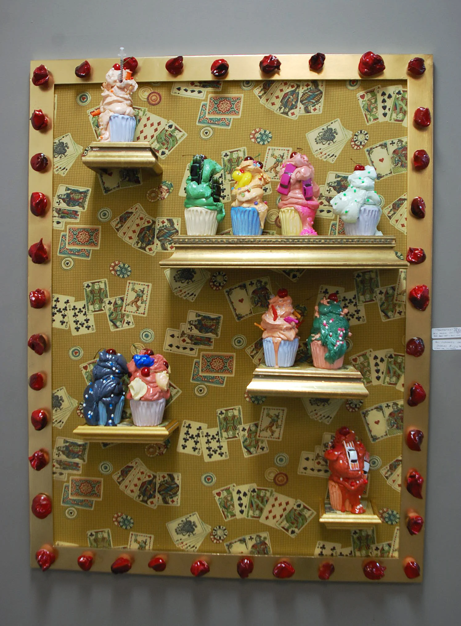 "All in The Cards" 2017 Wood, Resin, Ultra-cal, Hot-wheels, Fabric, Gold Shelves, Mix Media (Cupcake installation for Art Body and Soul Tattoo Shop New Haven CT)