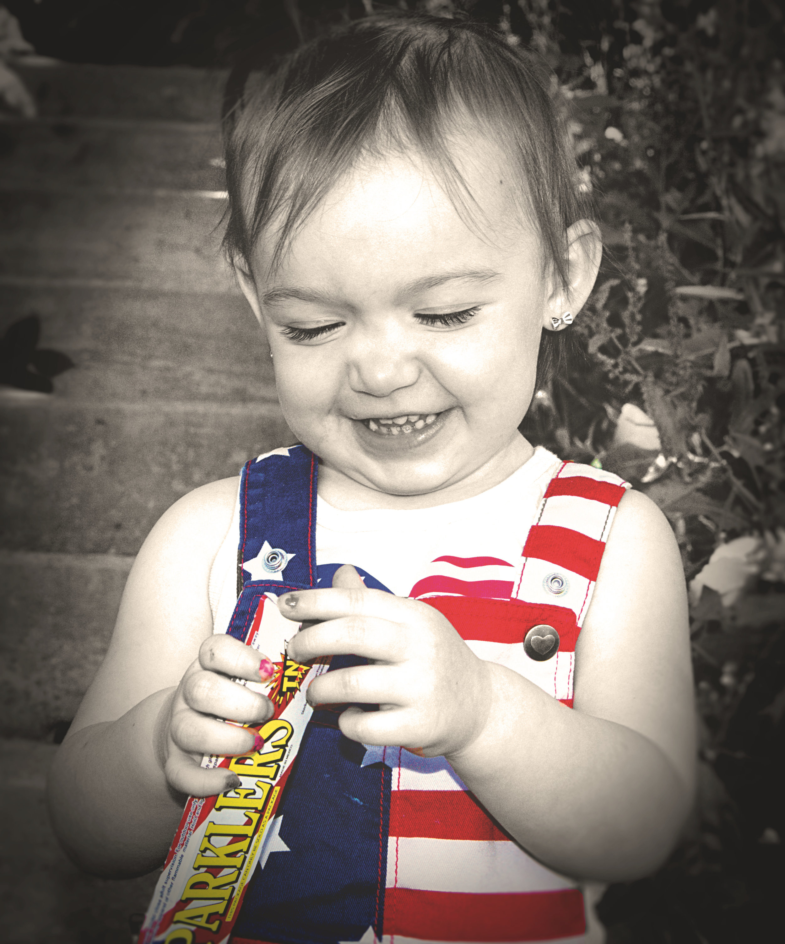 My niece trying to open sparklers this past 4th of July.