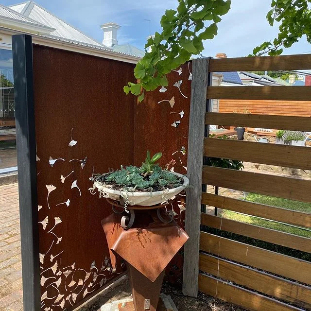 Our garden bowl, freshly planted out in succulents, sitting on our tablecloth plinth. #gardenart #sculpture #yardart #rustandconcrete #cortensteel #instatas