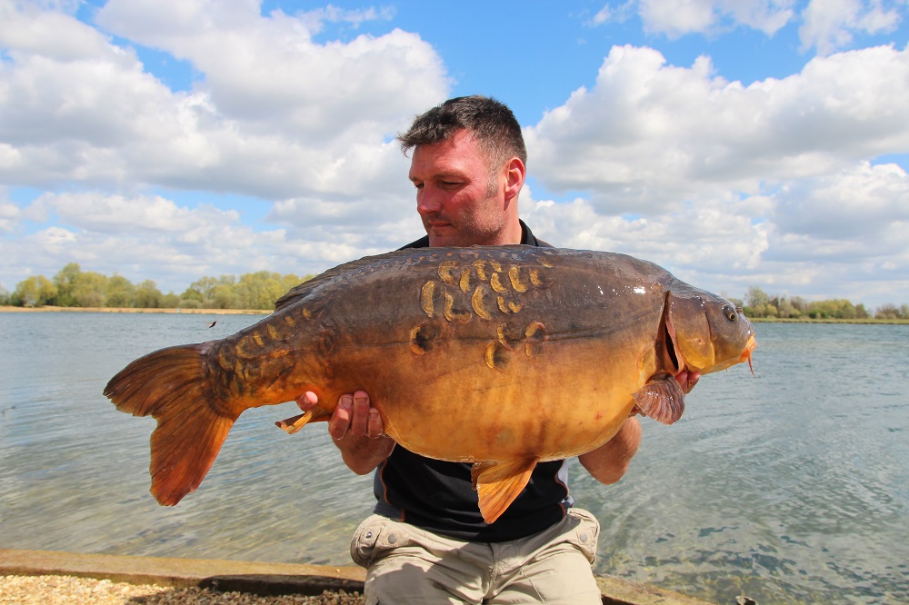 A 30lb-plus mirror caught on a parachute bag